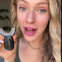 a girl holding teeth whitening kit 